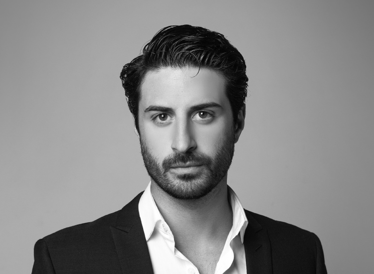 Male patient undergoing DHI hair transplant in Malaysia; implanter pen placing grafts at hairline for dense, natural coverage.